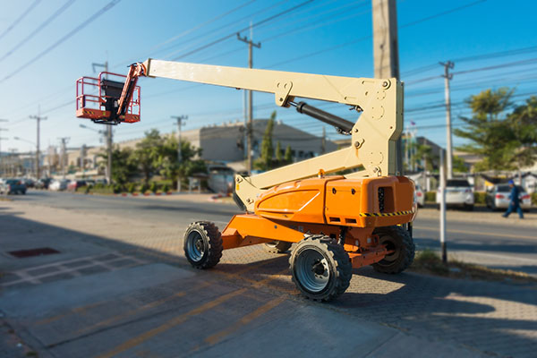 Boom lifting for construction work at site